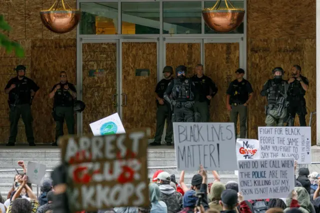 Police and protesters in Portland, Oregon