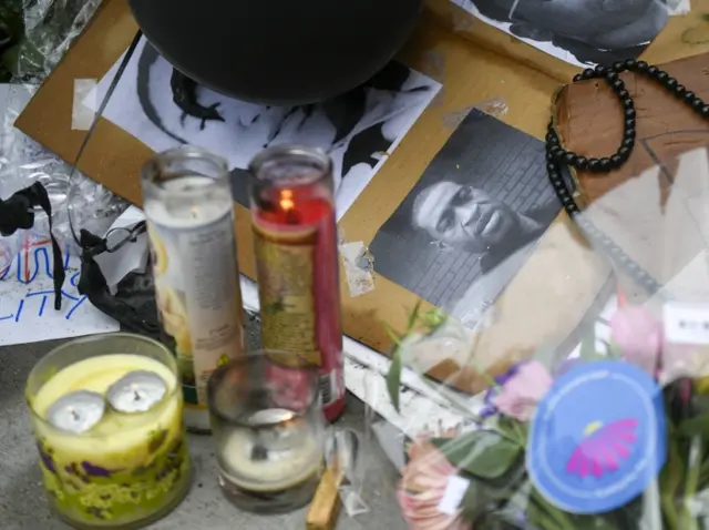 A photo of George Floyd at a makeshift memorial in Minneapolis