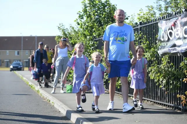 Parents drop of children at Queen"s Hill Primary School, Costessey, Norfolk