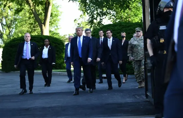 Trump walking out of the White House