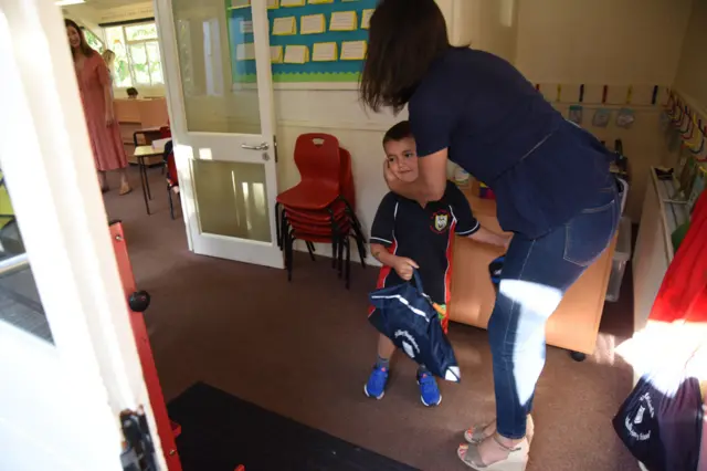 Pupil arriving at St Mary Magdalen's Catholic School in West London