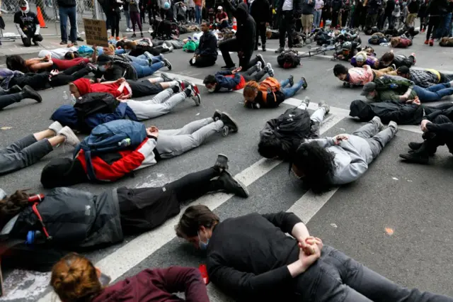 Portland protesters stage a "die-in" to protest the death of George Floyd