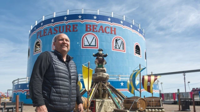 Man in front of 'Pleasure Beach' venue