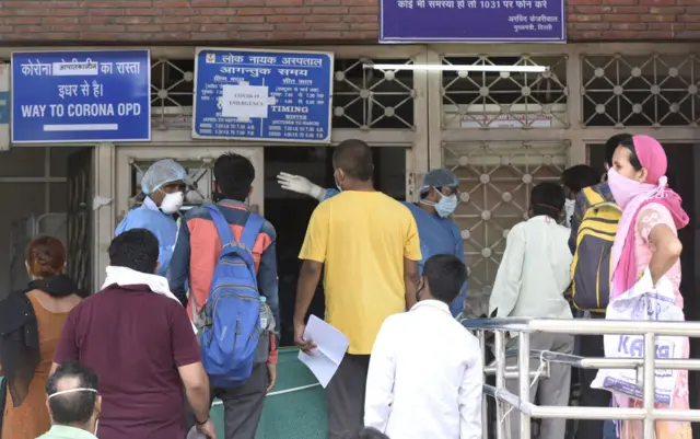 People at the Covid-19 OPD at Lok Nayak Jai Prakash (LNJP) Hospital on June 9, 2020 in New Delhi