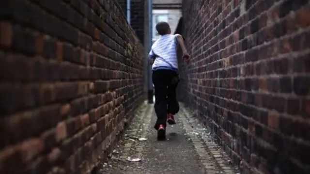 Child in alley