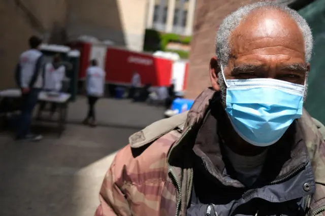 A homeless man walks out of a Doctors Without Borders/Médecins Sans Frontières (MSF) temporary shower trailer in Manhattan for the homeless and other vulnerable communities on on May 07, 2020 in New York City