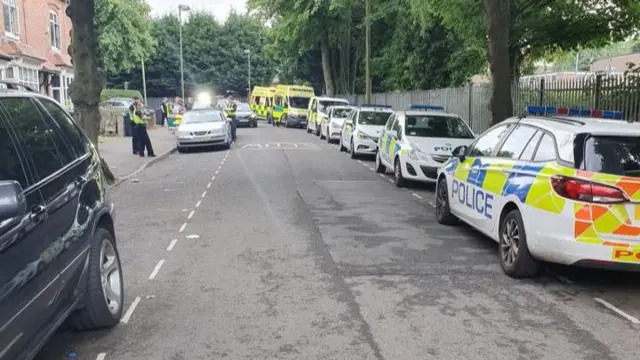 Police and ambulances on street