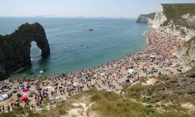 Crowds on the beach at Durdle Door, near Lulworth on 30 May 2020