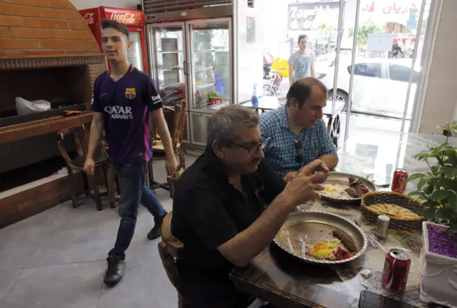 Iranians eating in a restaurant in Tehran