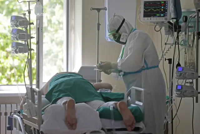 A nurse in an intensive care unit in a Moscow hospital