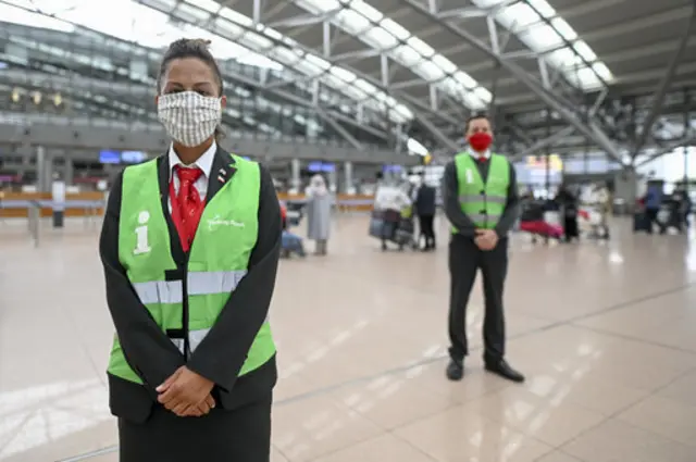 Staff with masks at Hamburg Airport