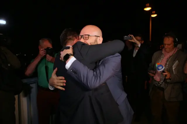 Mayor of Slubic Mariusz Olejniczak (L) is welcomed by Mayor of Frankfurt Rene Wilke (R) at the Polish-German border in Slubice, werstern Poland, 13 June 202