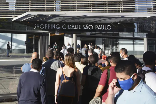 People visit a shopping mall in Sao Paulo