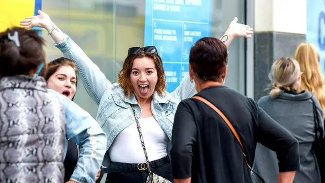 Shoppers queue for a Primark store