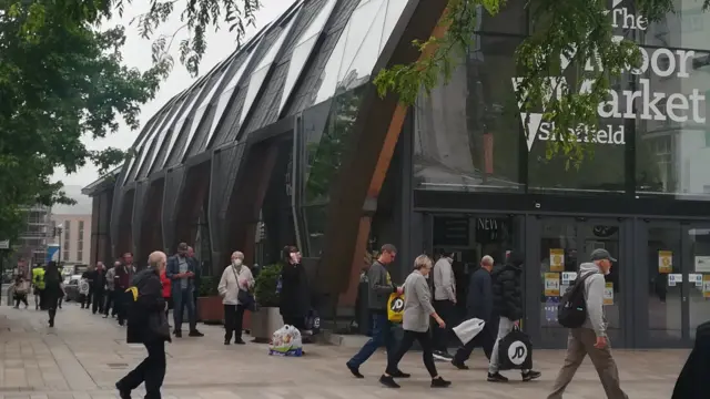 People queuing outside the Moor Market