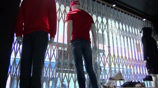 Mannequins in a shop window