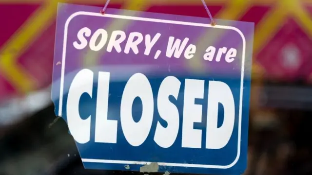 Sign 'Sorry, we are closed'