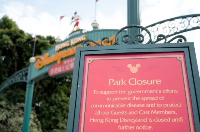 Image shows Hong Kong Disneyland closure sign