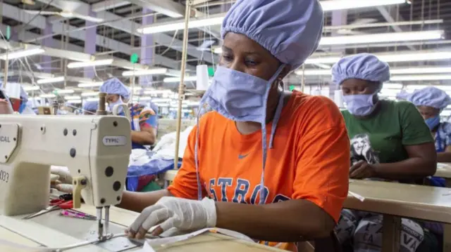 Workers making personal protective equipment in Accra