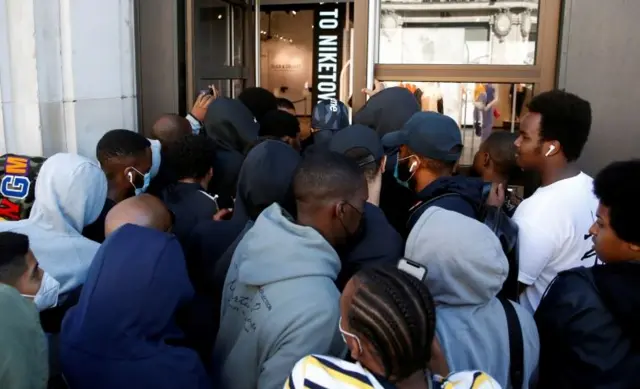 People outside Nike Town