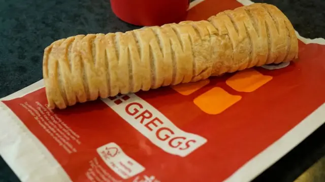 Greggs vegan sausage roll on a paper bag