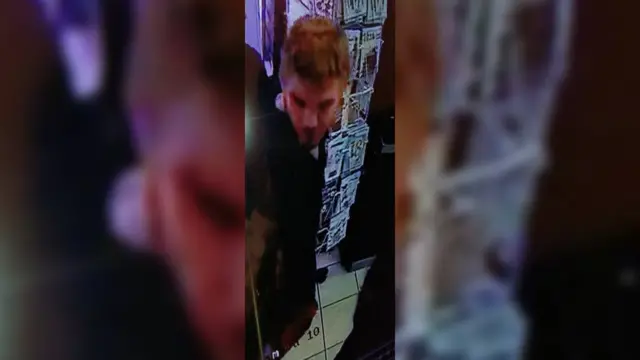 A CCTV image of a man