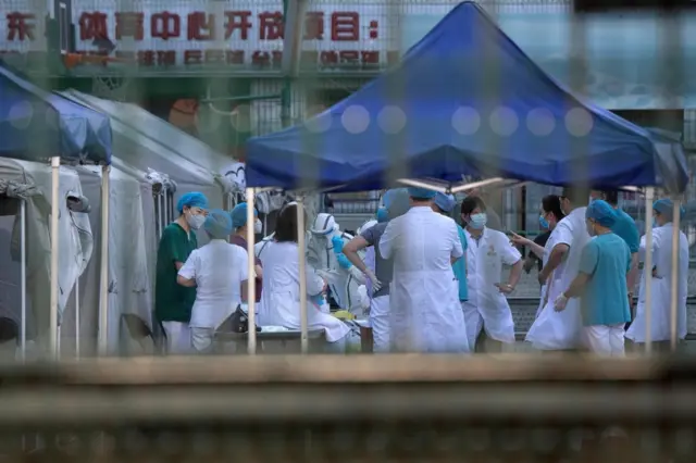 A Beijing official warned the new outbreak - linked to an open air market - is "extremely severe"