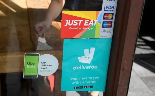 Restaurant window with Deliveroo sign