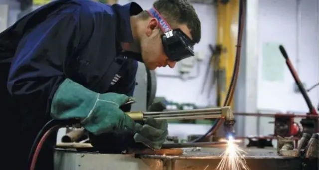 Student with work goggles