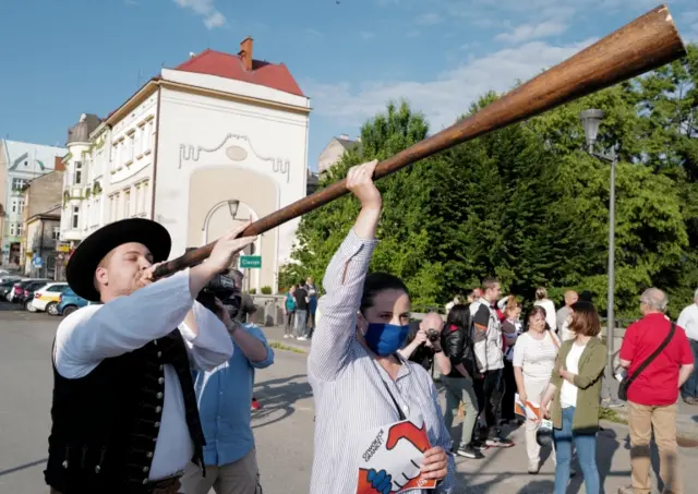 Residents of Cieszyn take part in a "Silent Protest" on the Friendship Bridge, in Cieszyn, Poland, 15 June 2020