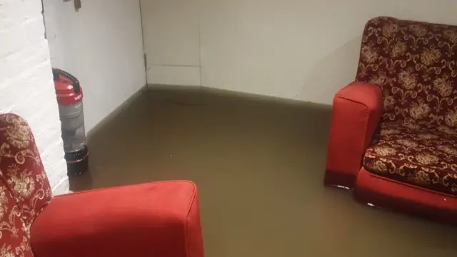 Floodwater around chairs