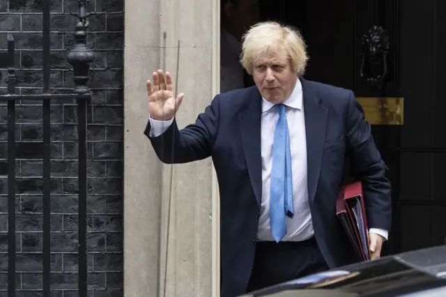 Boris Johnson waving