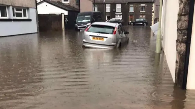 Flooded street in Pentre