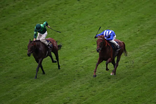 Molatham, right, charged past Monarch Of Egypt in the final strides