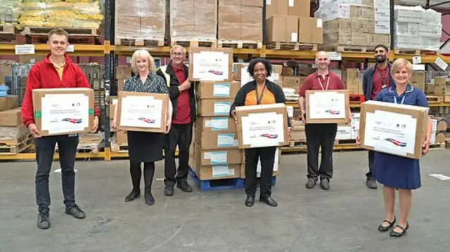 Boxes of masks being donated