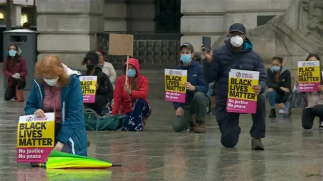 Black Lives Matter protesters kneel in Market Square, Nottingham