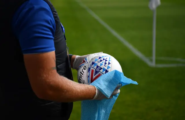 Cleaning a match ball