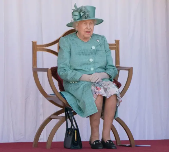 Britain's Queen Elizabeth II attends a ceremony to mark her official birthday at Windsor Castle in Windsor on 13 June 2020