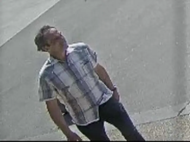 Man in shirt South Yorkshire Police wish to speak to