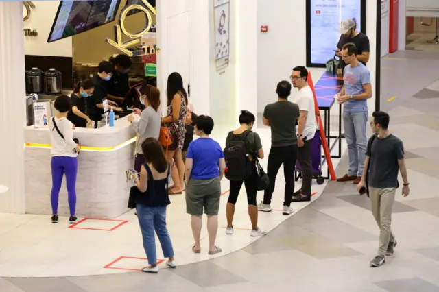 People queue to buy bubble tea