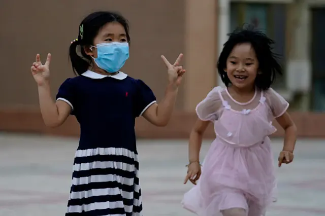 A girl is seen wearing a mask in Beijing, China