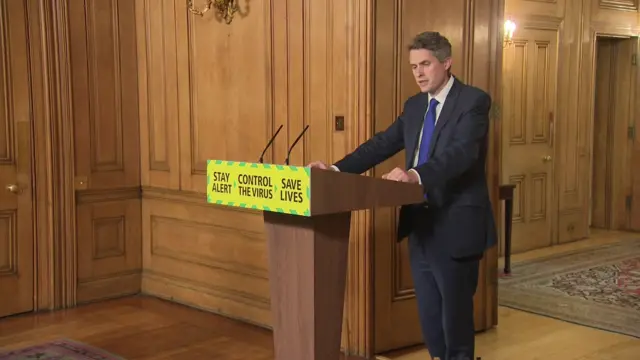 Gavin Williamson delivering the daily briefing