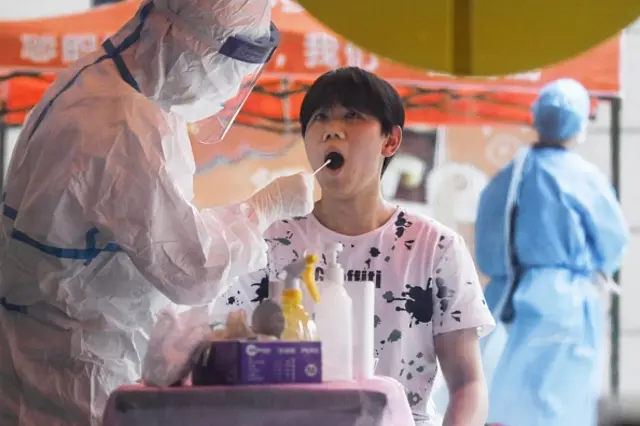 A man is tested for coronavirus in Wuhan