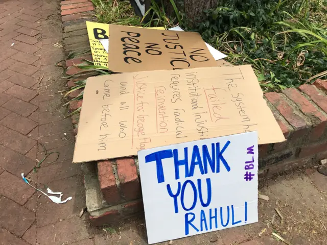 Flowers and signs of thanks outside Rahul's house on Tuesday