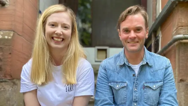 Grant McNaughton and Shona MacLeod sitting on the steps.