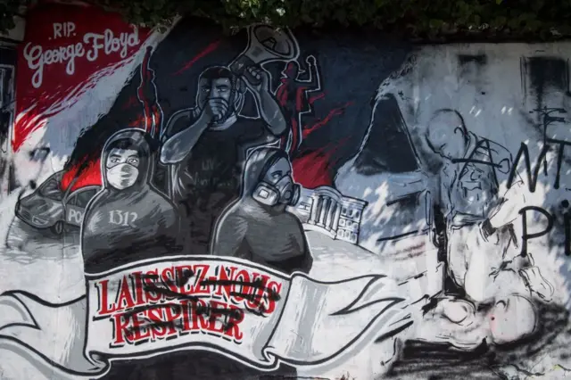 which translates as "let us breathe" of a mural memorial in Nantes, western France