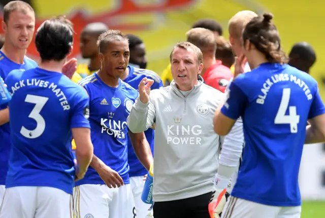 Leicester City manager Brendan Rodgers talks to his players