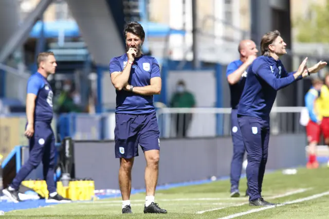 Huddersfield Townn boss Danny Crowley looks on during his side’s loss against Wigan.