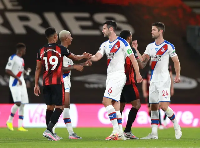 Bournemouth and Crystal Palace players shake hands