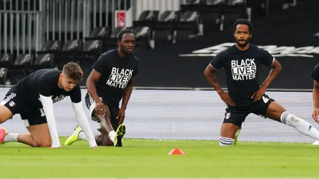 Fulham players warm up with Black Lives Matter T-shirts